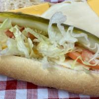 Veggie Sandwich · Fresh French bread topped with mayo, tomato, pickle, lettuce, onion, mozzarella and American...
