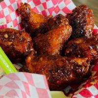 Baked Bone-In Wings (Per Lb) · Our baked bone-in traditional wings. They're awesome! 6-7 wings per lb, house favorite.