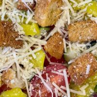 House Salad · Romaine lettuce, tomatoes, onions, cucumbers, pepperoncini, croutons, and parmesan cheese.