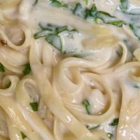 Fettuccine Alfredo · Fettuccine pasta served with creamy alfredo sauce. Add chicken and/or spinach upon request. ...