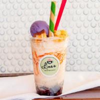 Halo-Halo · A favorite Filipino dessert. Halo-Halo is finely shaved ice drizzled with evaporated milk. O...