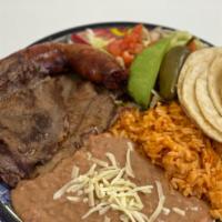 Bistec Con Chorizo Asado · Carne Asada & Mexican Sausage

Grilled bistec & Mexican sausage served with a side of rice, ...