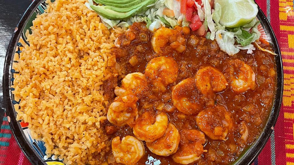 Camarones A La Diabla · Shrimp a la Devilish

Shrimp cooked in garlic butter then simmered in a spicy chipotle sauce. Served with a side of rice & tortillas.