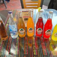 Refresco Botella (Glass Bottled Soda) · Mexican Coca-Cola,  Mandarin Jarritos, Pineapple Jarritos, Fruit Punch Jarritos, Strawberry ...