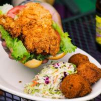 Chicken Po'Boy · Can be served blackened or grilled. Tender chicken breast fried golden brown and served on a...