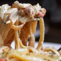 Crawfish Fettuccine · No need to peel this crawfish, 'cause it's just the tails swimming in a Parmesan cream sauce...