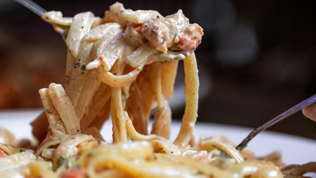 Crawfish Fettuccine · No need to peel this crawfish, 'cause it's just the tails swimming in a Parmesan cream sauce and plenty of pasta.