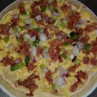 Pizzomelette · Cheese sauce, eggs, onion medley and includes one choice of crispy bacon, Canadian bacon, sa...