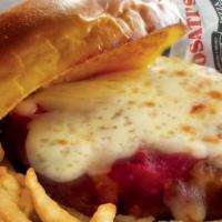 Chicken Parmigiana · Breaded chicken breast baked with marinara sauce and mozzarella cheese on top. 840 Cal.