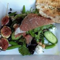 Prosciutto Fig Avocado Toast · Avocado toast with prosciutto, figs, goat cheese, and balsamic.