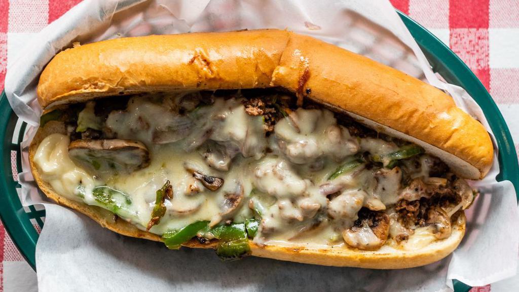 Philly Cheesesteak · Best Seller. Skillet-grilled steak, mozzarella cheese, sautéed onions, mushrooms, green peppers, and mayo.