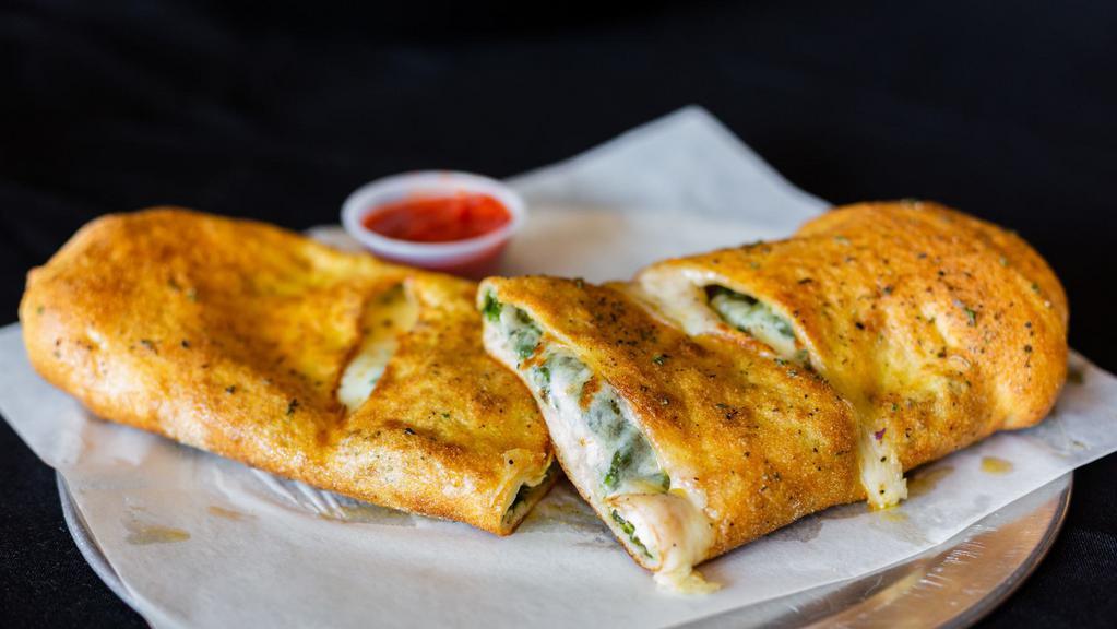 Stromboli · Vegetarian. Our award-winning dough is wrapped around mozzarella cheese, toasted in our oven, and topped with garlic butter and parmesan. Served with a side of homemade pizza sauce.
