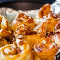 Cinnamon Pecan Pinwheels · Vegetarian. Homemade pizza dough with cinnamon sugar rolled and baked. Basted with butter an...