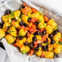 Tater Tot Works · Vegetarian. Tater tots smothered in nacho cheese, scallions, tomatoes, and black olives.