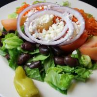 Greek Salad · Romaine, vine ripe tomato wedges, red onions, cucumber slices, shredded carrots, feta, kalam...