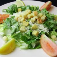 Simple Caesar Salad · Hearts of romaine, vine ripe tomato wedges, shredded Parmesan, seasoned croutons, and creamy...