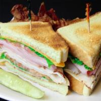 Club · Ham, smoked turkey, apple smoked bacon, sharp cheddar and aged swiss cheese served on toaste...