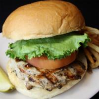 Grilled Chicken · Marinated grilled chicken breast with choice of provolone, swiss or pepper jack cheese. Serv...