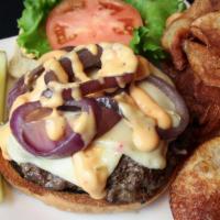 Rocky Marciano Patty Melt · Half pound patty with pepper jack cheese, grilled onions and thousand island dressing on toa...