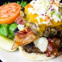 Tko · One of half-pound blue cheese and bacon layered between two-three of four Angus Patties, top...