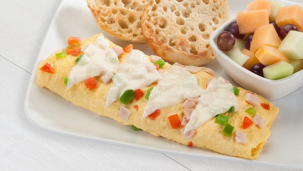 Smoked Turkey Omelette · Egg whites or egg substitute smoked turkey tomatoes bell peppers swiss cheese fresh fruit dry toasted english muffin.