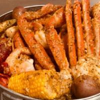 Seafood Lover · 1LB of shrimp, 2 Cluster  snow crab legs, 1LB of crawfish, 1LB of mussels, three pieces of c...