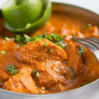Murg Tikka Masala · Tender tandoori-cooked boneless chicken curried in a special sauce.