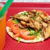 Photo'S Grilled Chicken Pita · Chopped grilled chicken breast with creamy mayonnaise, shredded lettuce and diced tomatoes.