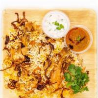 Chicken Biryani · Authentic hyderabadi dum biryani cooked w/ chicken, spices, premium basmathi rice, garnished...