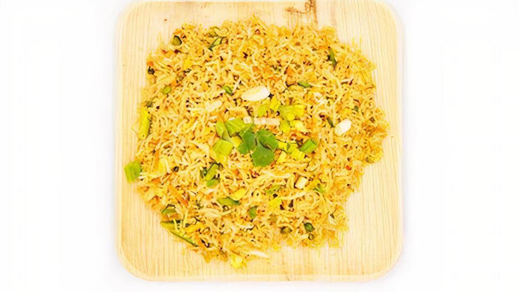 Veg Fried Rice · Fried rice made w/ extra long grain basmathi rice sauteed w/ carrots, beans & flavored w/ spices.