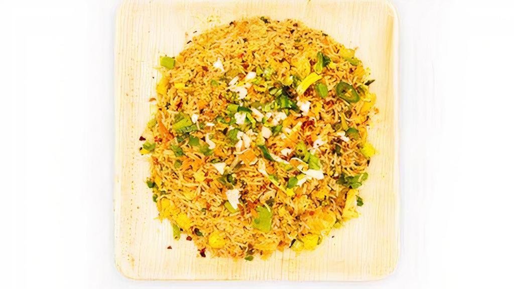 Egg Fried Rice · Fried rice made w/ extra long grain basmathi rice sauteed w/ carrots, beans, eggs & flavored w/ spices.