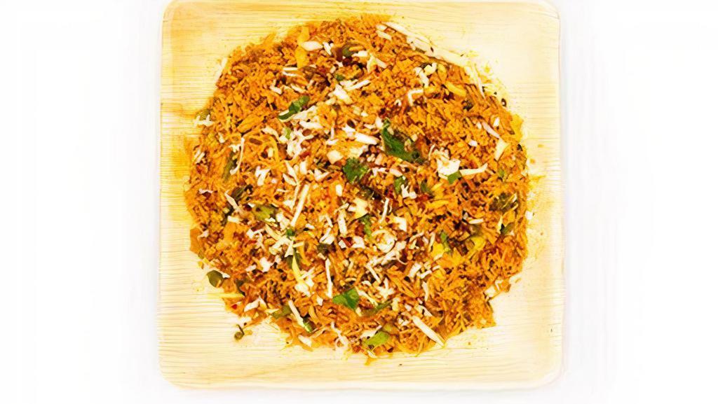 Veg Schezwan Fried Rice · Fried rice made w/ extra long grain basmathi rice sauteed w/ carrots, beans, chef's special schezwan sauce & flavored w/ spices.