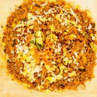 Egg Schezwan Fried Rice · Fried rice made w/ extra long grain basmathi rice sauteed w/ carrots, beans, eggs, chef's sp...