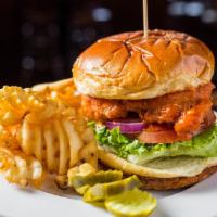 Buffalo Chicken · Fried chicken breast, tossed in our buffalo sauce, with lettuce, tomato and red onion on bri...