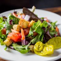 Side Salad · Spring mix, tomato, onion, carrot, pepperoncini, and croutons.