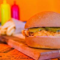 Original Chicken Sandwich · Crispy, golden chicken hand-breaded, topped with crunchy pickles and our signature  flavorfu...
