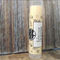 Good Earth Lip Butter Buttercream · 0.15 oz tube of handcrafted lip butter.