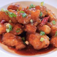 Spicy Orange Chicken · Crispy chicken, thai chili peppers with sweet and spicy chili sauce.