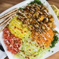 Chicken Over Rice · Our own style plate comes with grilled chicken, tomatoes, lettuce and our famous white and f...
