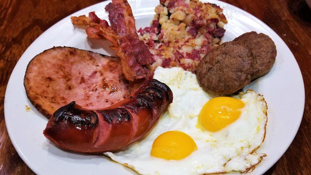 500'S Combo Meal · 2 Sausage Patties, 2 Slice of Bacon, 1 Slice of Ham, 1 Smoked Sausage, Corned Beef Hash and 2 Eggs any Style
