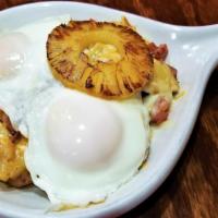Hawaiian Skillet · Ham, pineapple, mozzarella, and shredded cheeses and hash browns. Topped with two eggs any s...