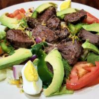 Avocado Steak Salad · Mixed lettuce, prime rib steak, red onions, tomatoes, green peppers, bacon, hard-boiled egg,...