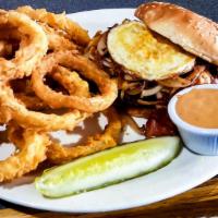 Brunch Burger · Crispy hash browns, grilled onions, bacon, american cheese, one egg any style and a side of ...