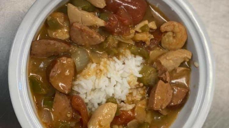 Gumbo · Savory Gumbo  made with Cajun Sausage, Shrimp, and Chicken. Only served with rice and cornbread muffin.