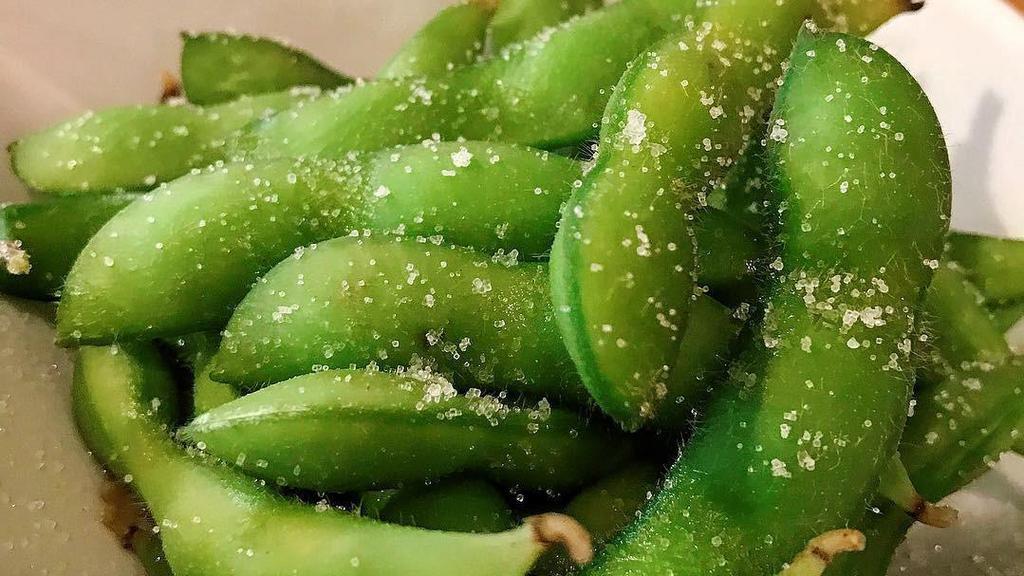Edamame · Steamed young soy beans with salt. Vegetarian option available.