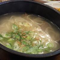 Seoul Beef Soup / 설렁탕 · Korean traditional beef bone broth with thin flour noodles, slices of beef shank, scallions,...