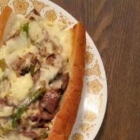 Philly Steak Sandwich · Thinly sliced steak, grilled onions, with mushrooms and green peppers and topped with melted...