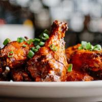 Wings · One pound of seasoned wings with your choice of sauce served with blue cheese or ranch dress...