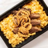 Brisket Mac · 14 hour slow smoked beef brisket sliced thick atop your mac with house BBQ sauce and crispy ...