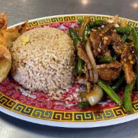 Green Bean Beef · White meat chicken with onions in a black bean sauce.